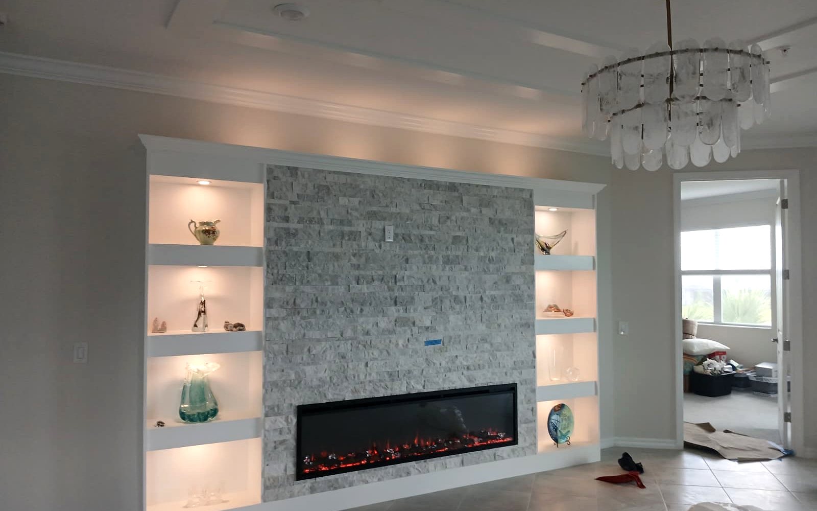 Custom built-in wall with fireplace